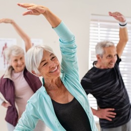people exercising in a group exercise class